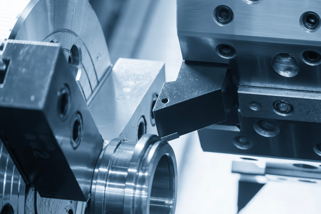 Detalhe visual de torno horizontal em m&aacute;quina.